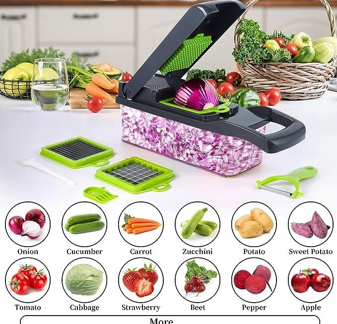 Multifunctional kitchen tool with various attachments on a kitchen counter, surrounded by vegetables.